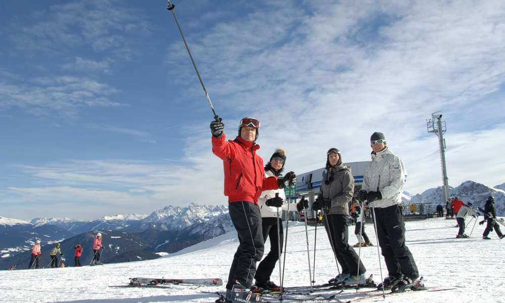 Fun on the slopes at the ski resort Plan de Corones